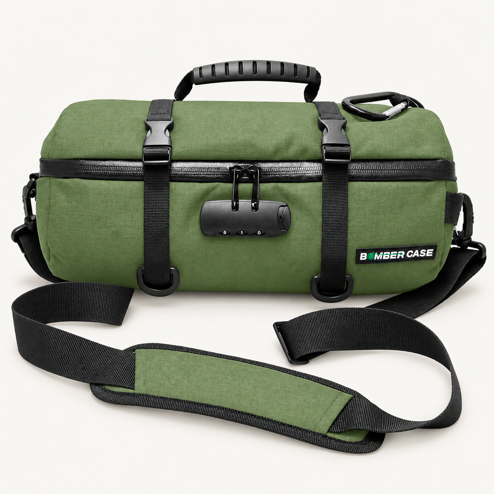 Green 14-inch Bomber Case locking duffle with carry handles, cinch straps and shoulder strap.