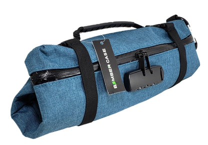 Blue XL Bomber Case bag rolled down and secured with its adjustable straps, shown in an original product photograph.